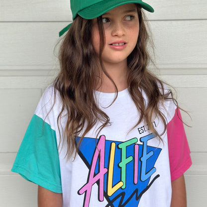 Alfie Bermuda Tee White Kids T-Shirt with Pink and Aqua Sleeves, Large ALFIE logo on front